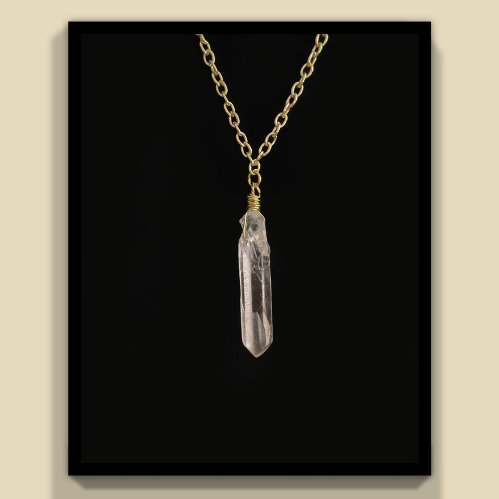 Gold necklace with wire wrapped raw Clear Quartz